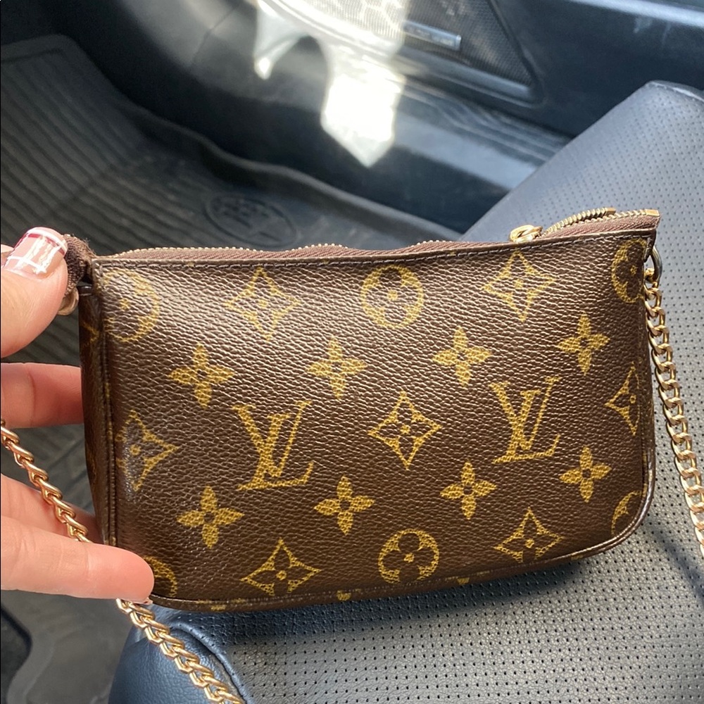 Louis Vuitton Brown Monogram Wristlet with Gold Accents